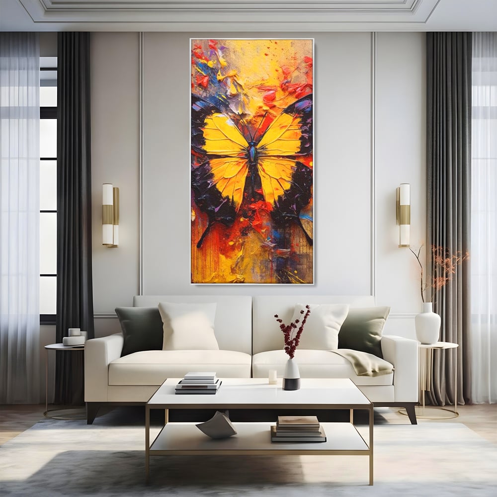 Tablou canvas cu pictura cu fluture galben, in rama de aluminiu argintiu, pe perete intr-un living